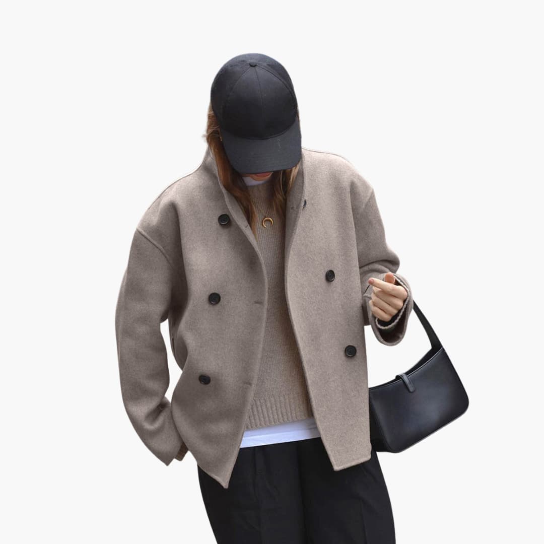 Damesjack met een ruime snit en knoopsluiting aan de voorkant